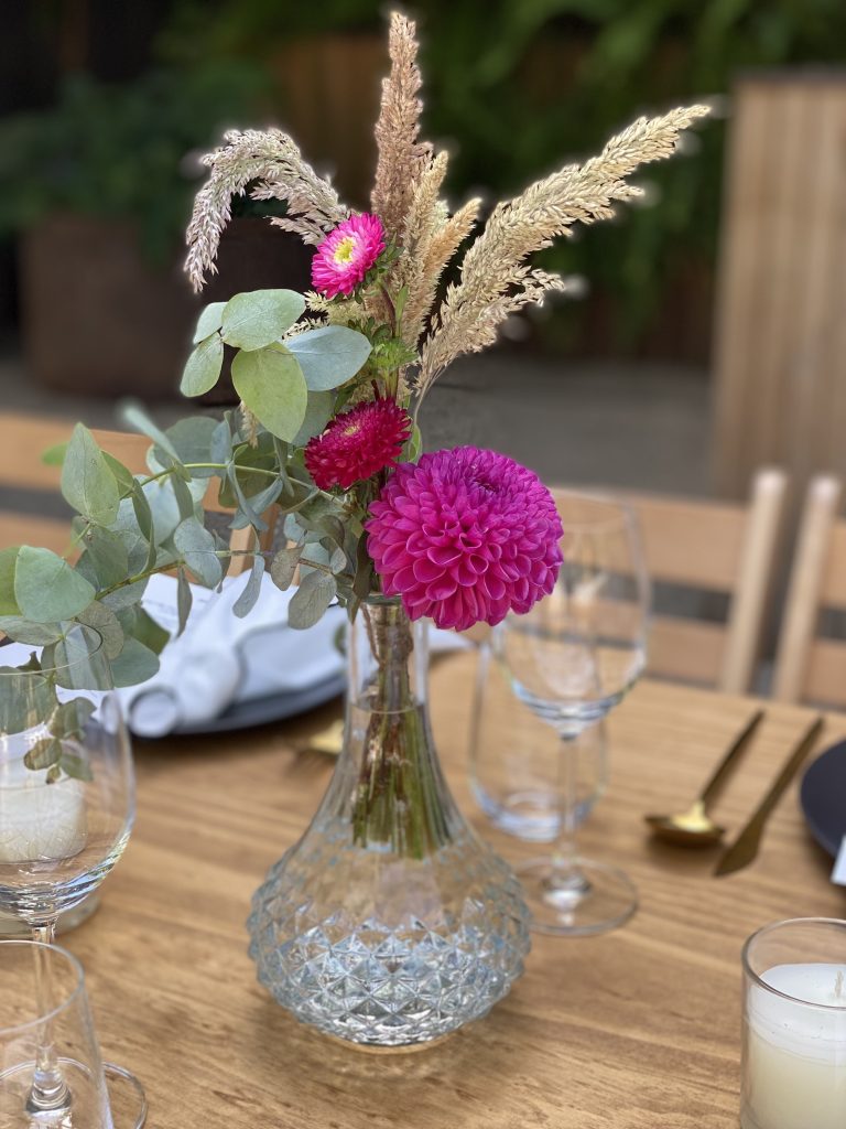 Bottle vase with flowers